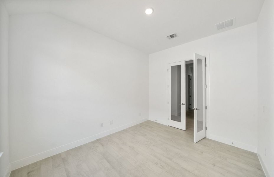 Representative unfurnished interior of a home built from the Chilton by Pulte Homes in Saddleback at Santa Rita Ranch, Liberty Hill (Image 11).