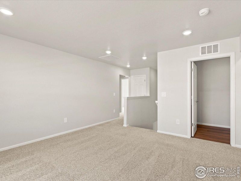 Upstairs loft space and laundry room