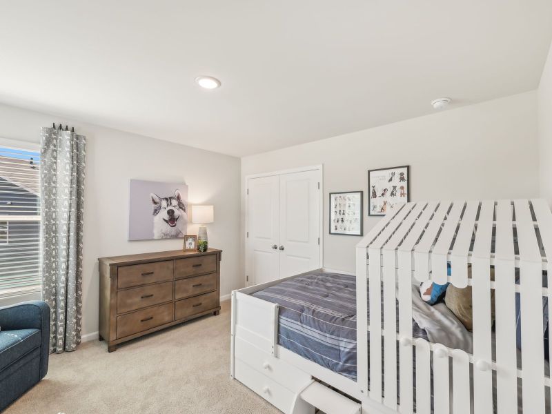 Secondary bedroom in the Jade floorplan at a Meritage Homes community in Mebane, NC. Secondary bedroom in the Jade floorplan at a Meritage Homes community in Mebane, NC.