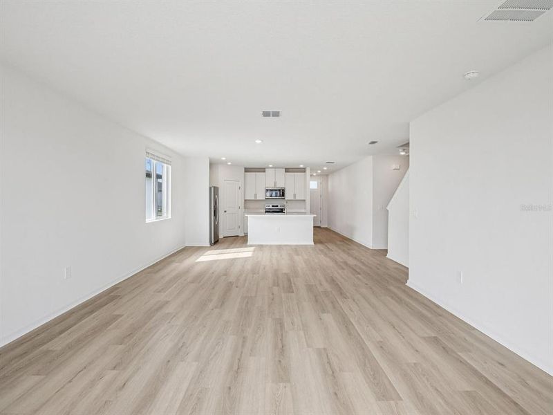 Spacious, unfurnished interior of a new home in The Grove at Stuart Crossing - Classic Series, Bartow (Image 27).