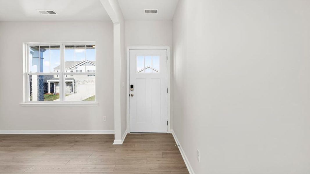 Spacious, unfurnished interior of a new home in Durbin Meadows Traditions, Fountain Inn (Image 15).