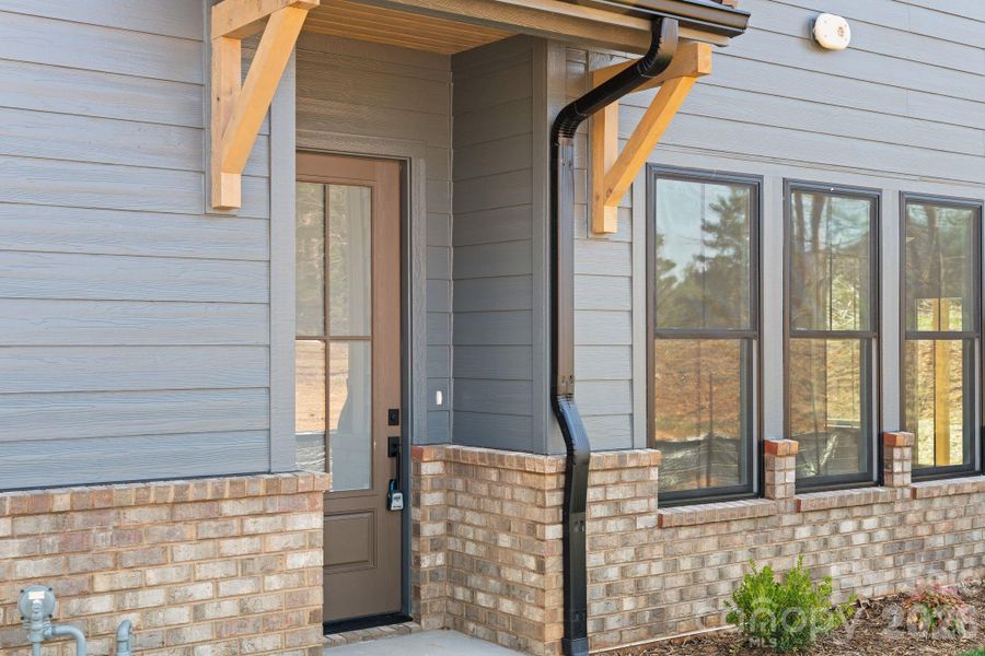 Exterior details and patio area of a home in , Asheville (Image 16). Exterior details and patio area of a home in , Asheville (Image 16).