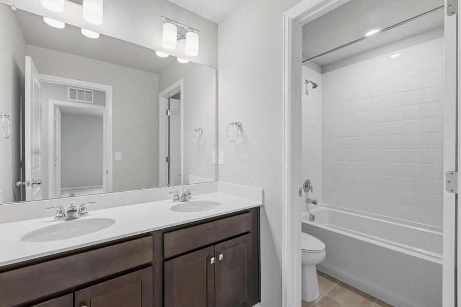 Furnished interior view inside a new home in Windler, Aurora (Image 6).