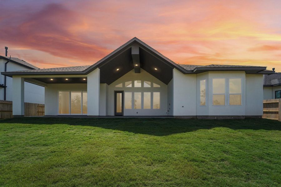 Exterior details and patio area of a home in Evergreen 70', Conroe (Image 3).