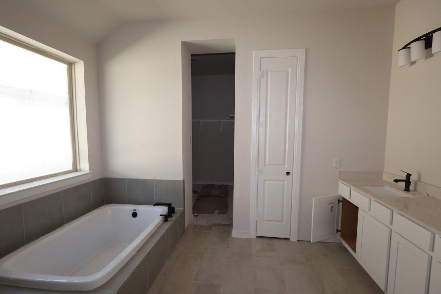 Furnished interior view inside a new home in Meridiana 45' Homesites, Manvel (Image 5).