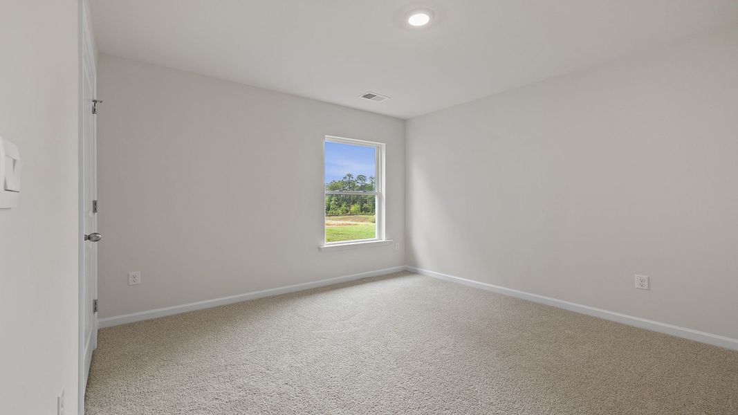 Spacious, unfurnished interior of a new home in Durbin Meadows Traditions, Fountain Inn (Image 17).