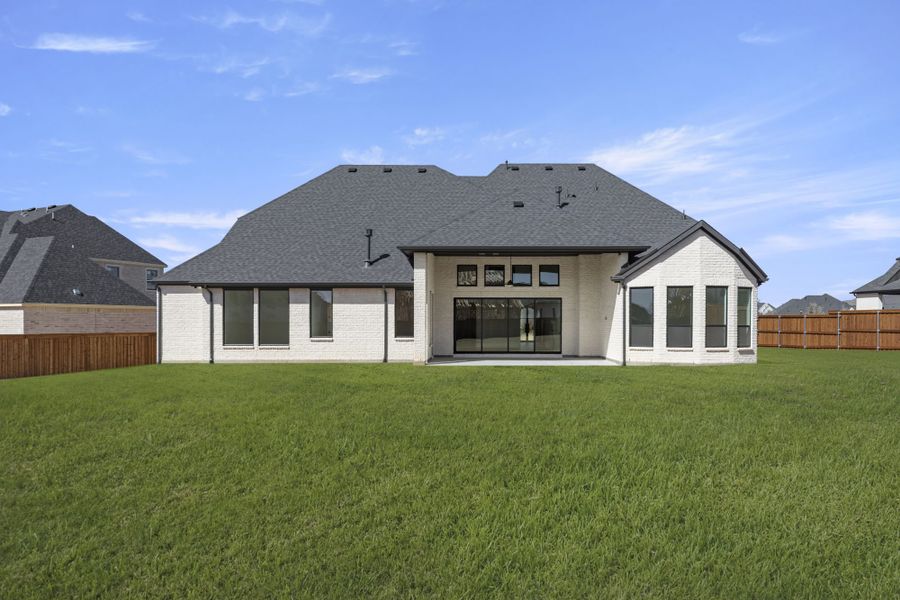 Exterior details and patio area of a home in Mustang Lakes, Celina (Image 32). Exterior details and patio area of a home in Mustang Lakes, Celina (Image 32).