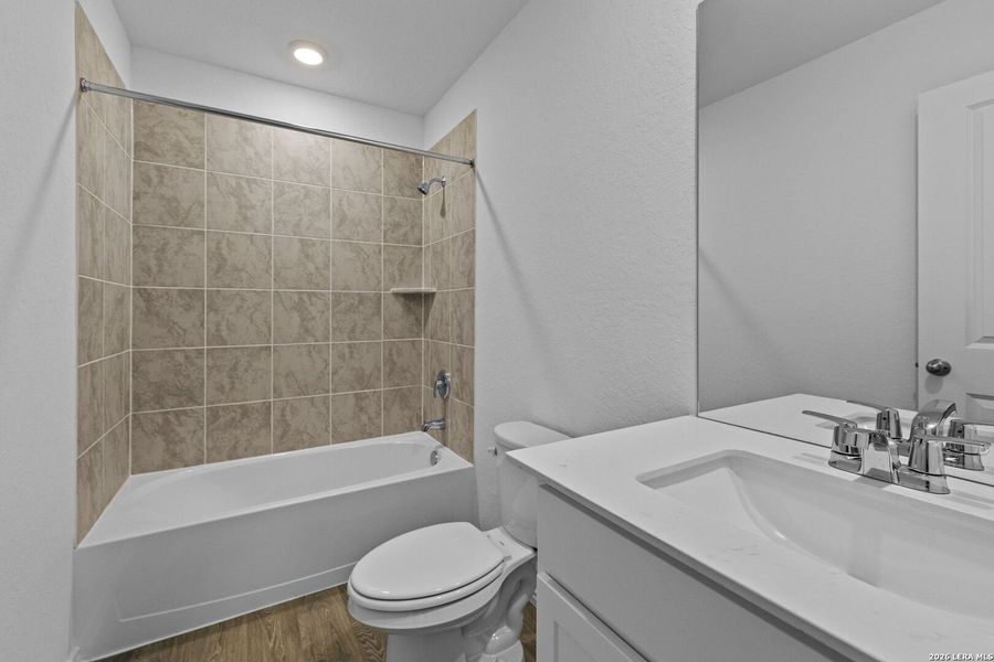 Furnished interior view inside a new home in Hickory Ridge, Elmendorf (Image 6).
