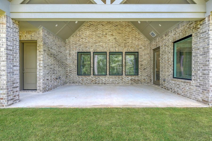 Exterior details and patio area of a home in The Cedars, Plantersville (Image 4). Exterior details and patio area of a home in The Cedars, Plantersville (Image 4).