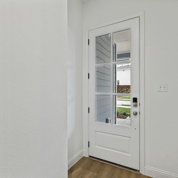 Representative unfurnished interior of a home built from the The Emery by Village Homes in Walsh, Aledo (Image 14).