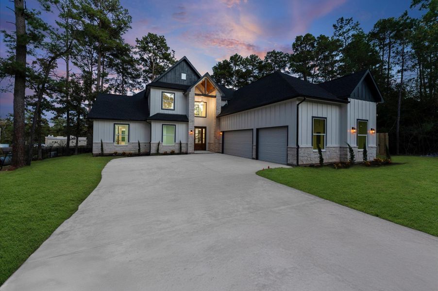 Front exterior of a new home in , Magnolia, TX, highlighting curb appeal (Image 23).