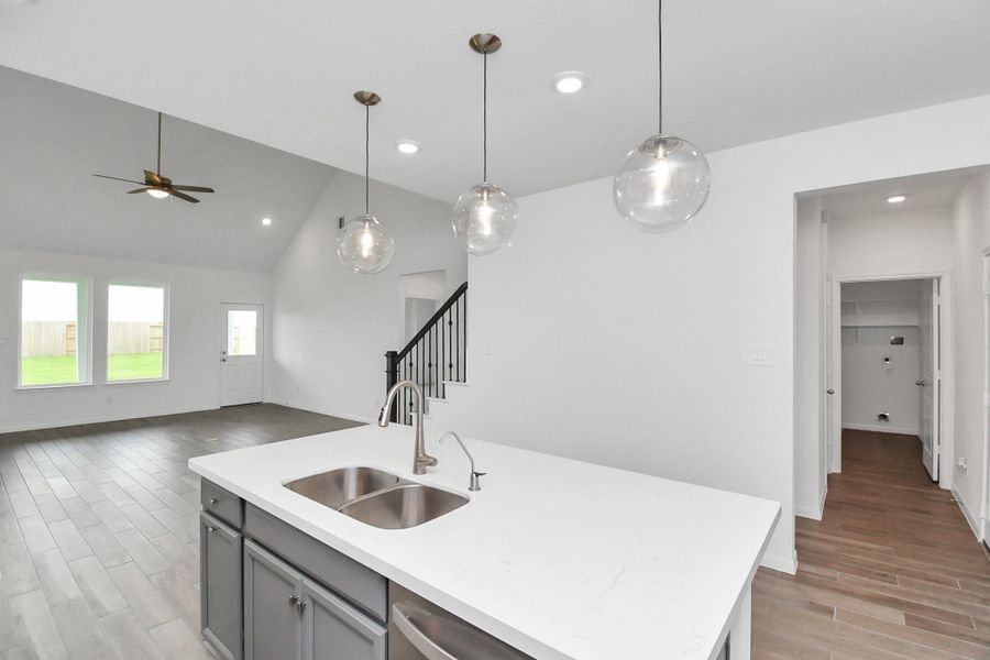 Furnished interior view inside a new home in Sunterra, Katy (Image 11).
