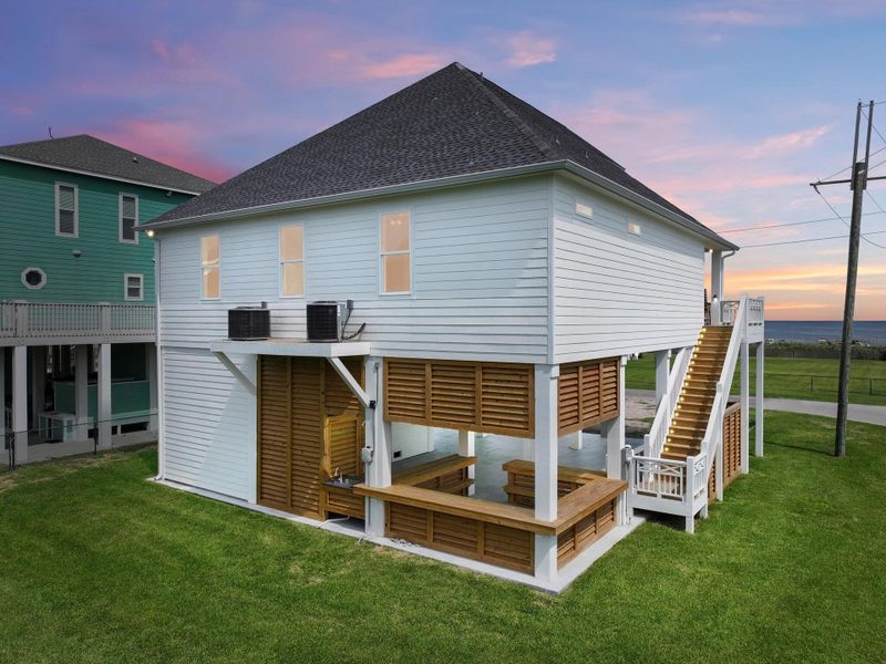 Front exterior of a new home in , Bolivar Peninsula, TX, highlighting curb appeal (Image 31). Front exterior of a new home in , Bolivar Peninsula, TX, highlighting curb appeal (Image 31).