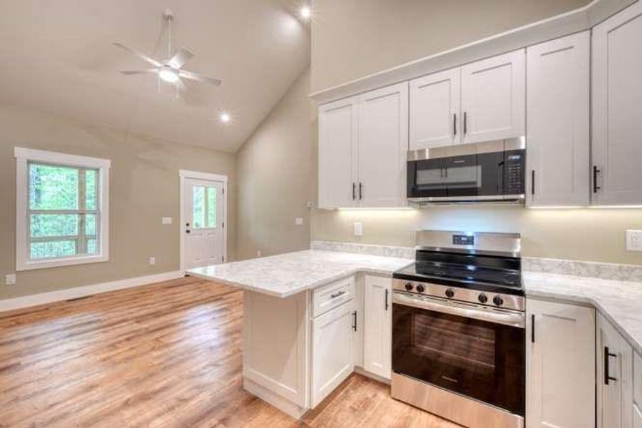 Furnished interior view inside a new home in , Blairsville (Image 3).