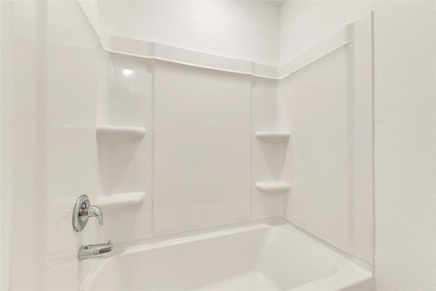 Full bath featuring shower / bathtub combination