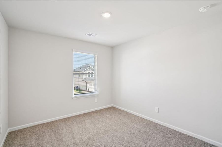 Spacious, unfurnished interior of a new home in Hawthorne Station, College Park (Image 35).