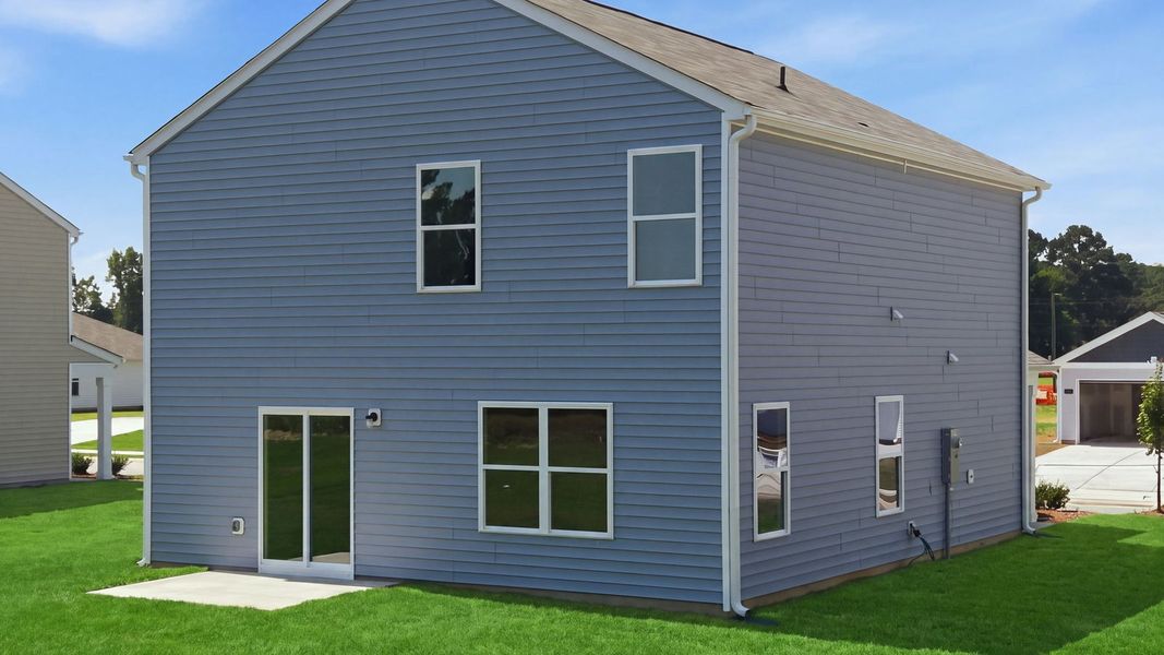 Exterior details and patio area of a home in Hobbs Farm, Ayden (Image 4).