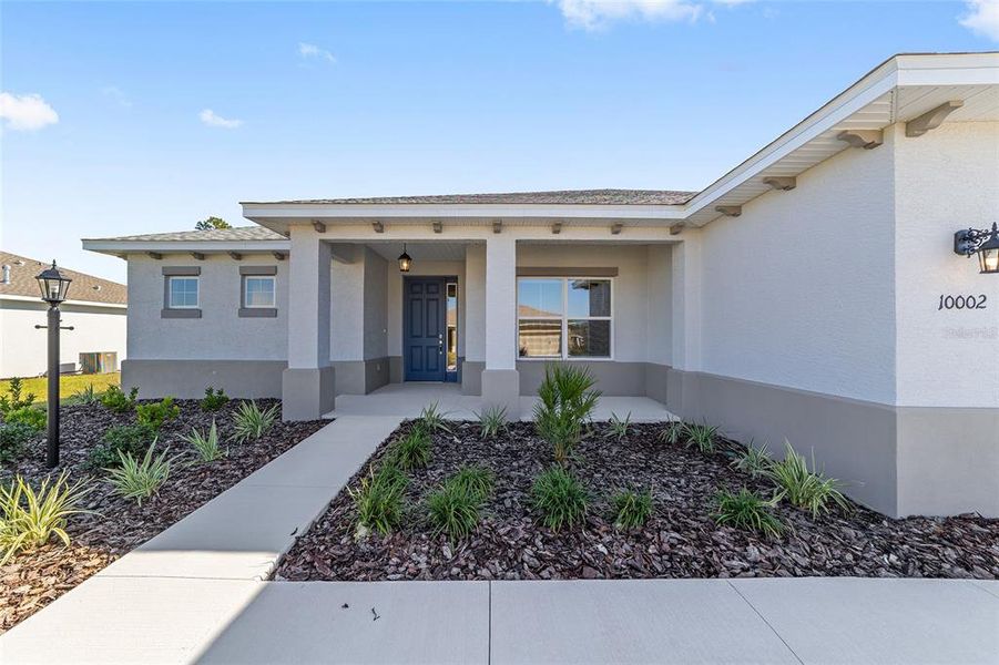 Front exterior of a new home in On Top of the World Communities, Ocala, FL, highlighting curb appeal (Image 19).
