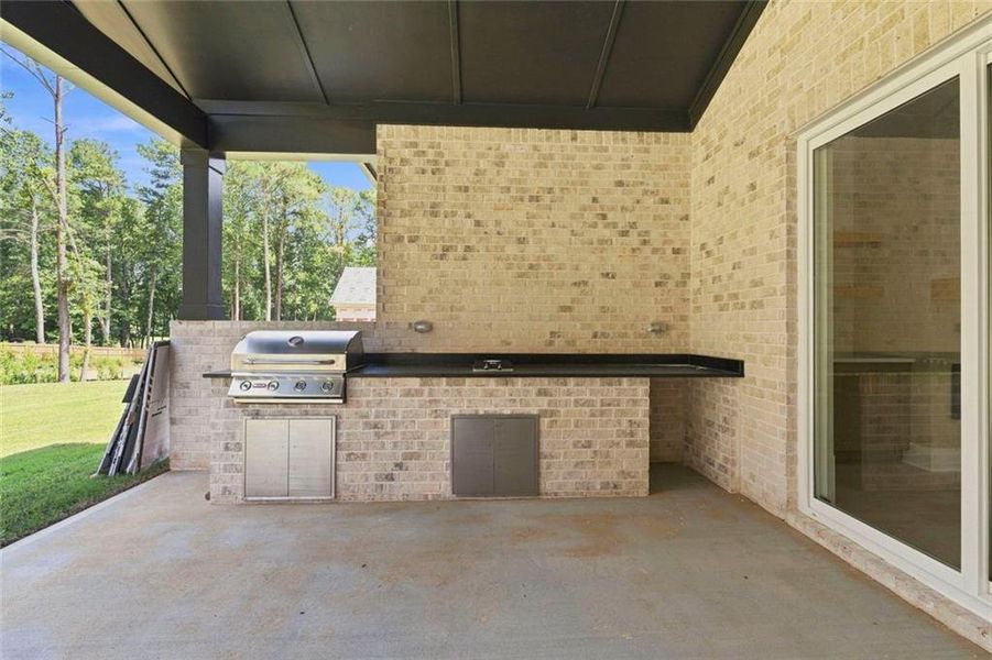 Exterior details and patio area of a home in , Loganville (Image 34).