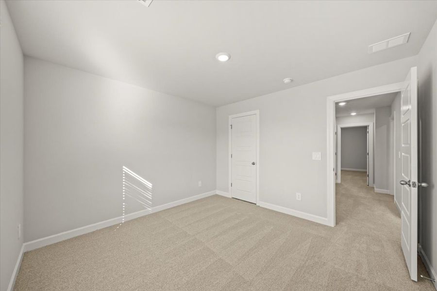 Spacious, unfurnished interior of a new home in The Farm at Wells Creek - Signature Collection, Gray Court (Image 22).