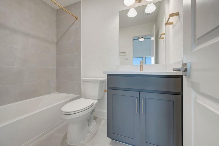Furnished interior view inside a new home in Riceland - Enclave Row Collection, Mont Belvieu (Image 11).