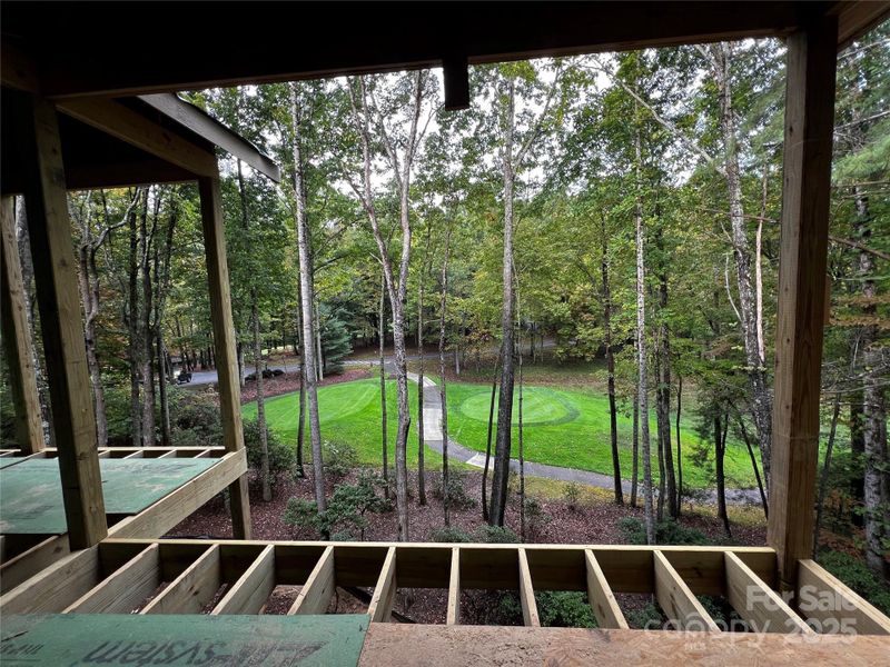 A covered grilling deck sits just off the screen porch and dining room. A covered grilling deck sits just off the screen porch and dining room.