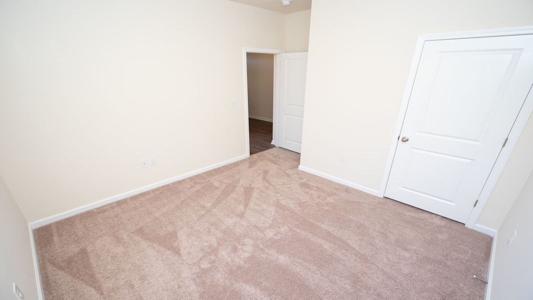 Representative unfurnished interior of a home built from the CALI by D.R. Horton in The Reserve at Wild Horse, Conway (Image 16).