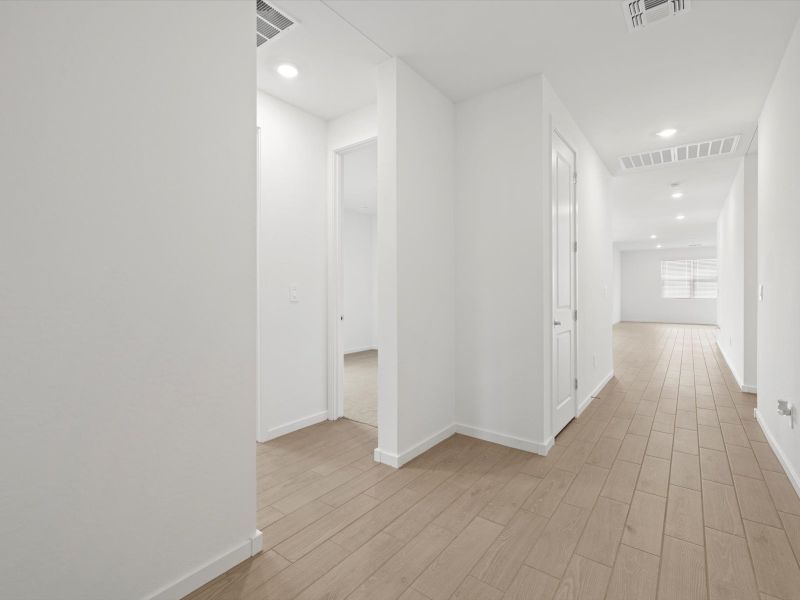 Spacious, unfurnished interior of a new home in Entrada Reserve Series, Tolleson (Image 13).