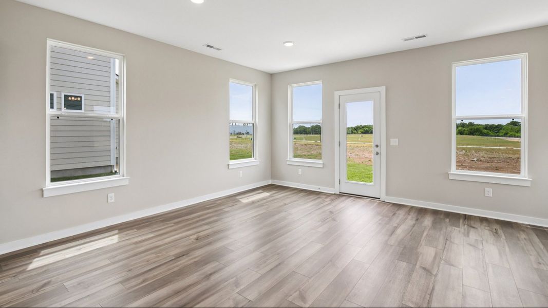 Dining Nook next to kitchen and rear door