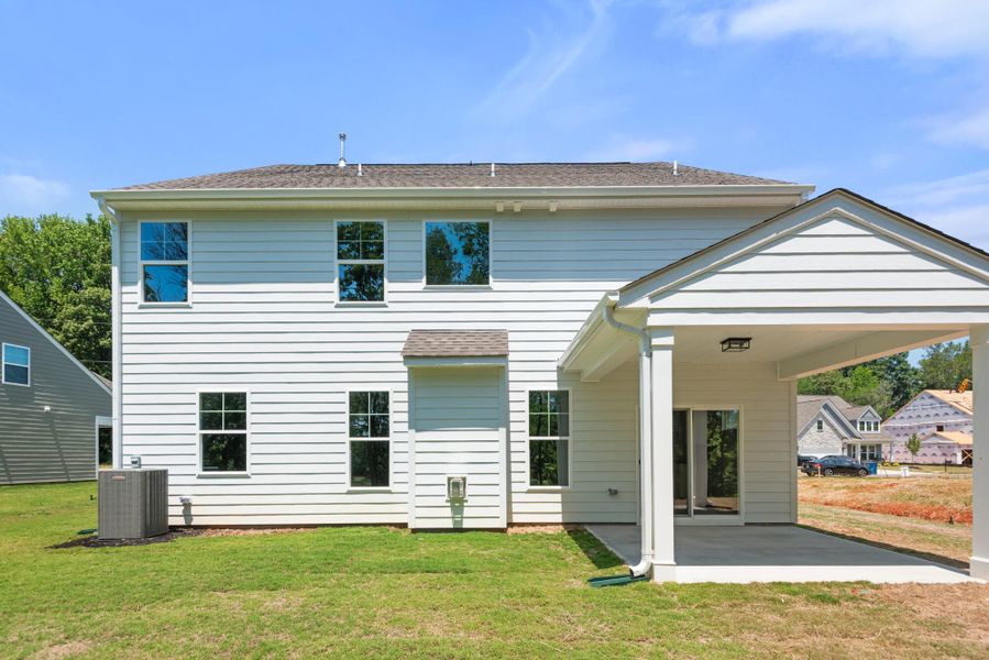 Exterior details and patio area of a home in Fiddler's Ridge, Advance (Image 23).