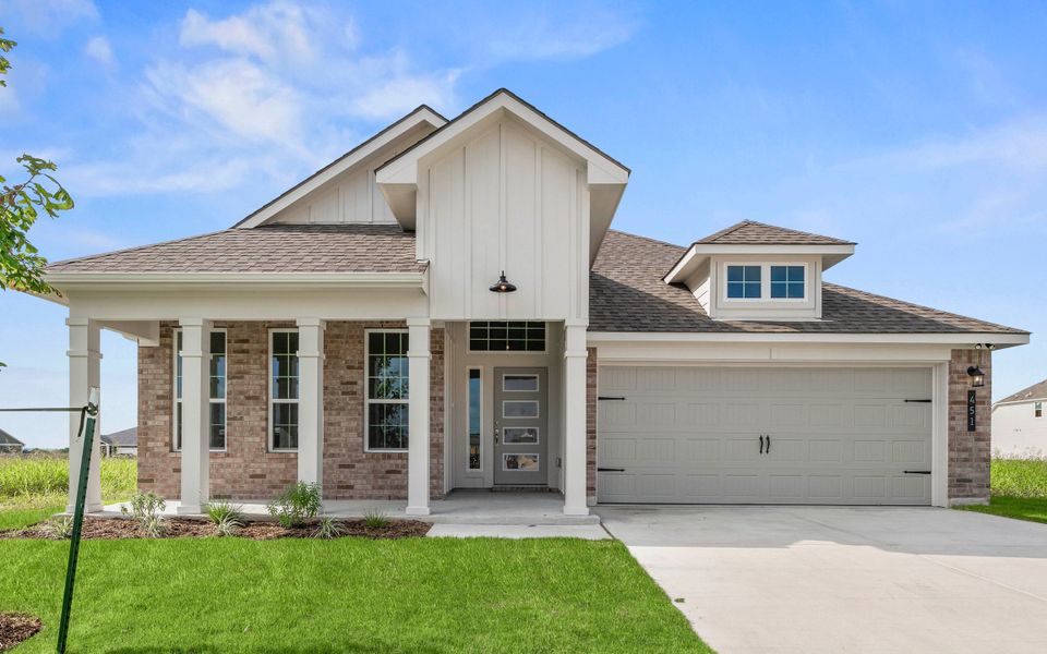 Front exterior of a new home in Arroyo Ranch, Seguin, TX, highlighting curb appeal (Image 1). Front exterior of a new home in Arroyo Ranch, Seguin, TX, highlighting curb appeal (Image 1).