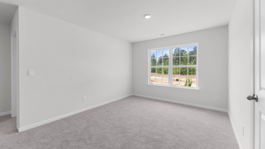 Spacious, unfurnished interior of a new home in West New Bern, New Bern (Image 28).