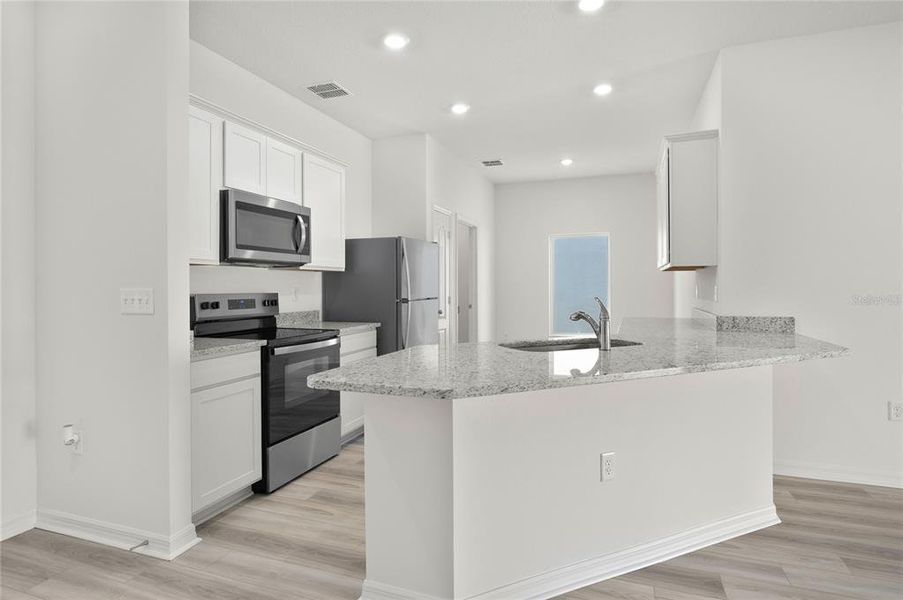 Furnished interior view inside a new home in Tula Parc, Astatula (Image 4). Furnished interior view inside a new home in Tula Parc, Astatula (Image 4).