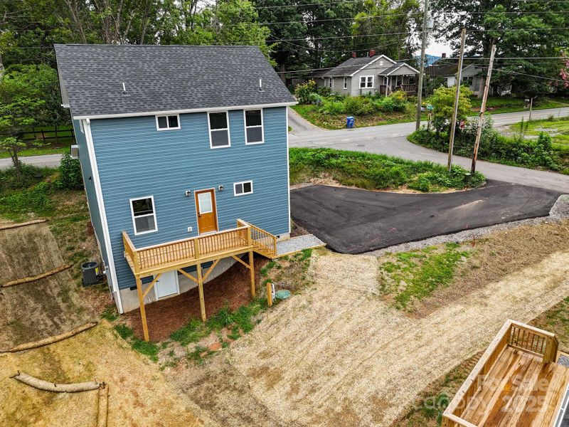 Front exterior of a new home in , Asheville, NC, highlighting curb appeal (Image 29).