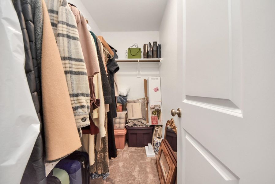 Look at this amazing walk-in closet for bedroom #2!! So much hanging and storage space for a bedroom closet. Look at this amazing walk-in closet for bedroom #2!! So much hanging and storage space for a bedroom closet.