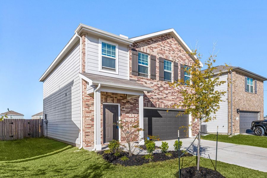Front exterior of a new home in , Houston, TX, highlighting curb appeal (Image 27). Front exterior of a new home in , Houston, TX, highlighting curb appeal (Image 27).