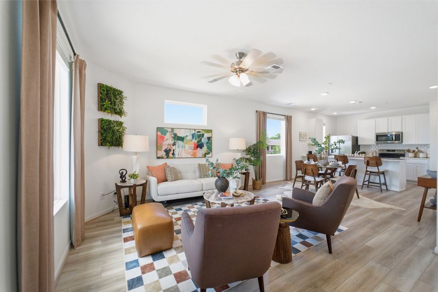 Representative furnished interior of a home built from the Kahn by CastleRock Communities in Municipal Drive Townhomes, Leander (Image 5).