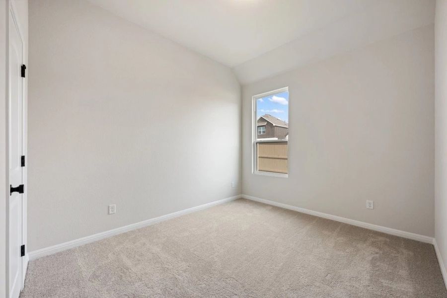 Spacious, unfurnished interior of a new home in The Colony 50s, Bastrop (Image 23).