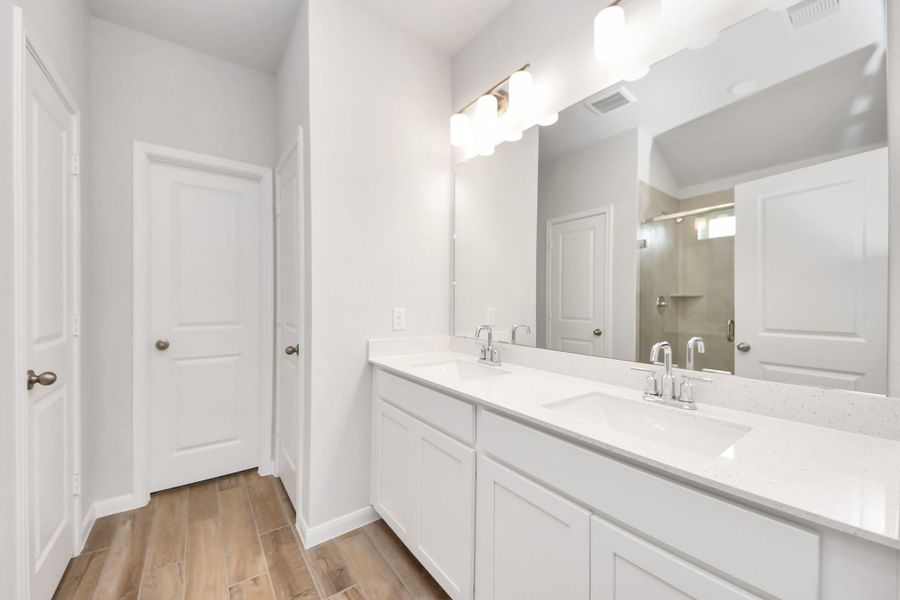 Furnished interior view inside a new home in Sunrise Cove: Landmark Collection, Texas City (Image 1).