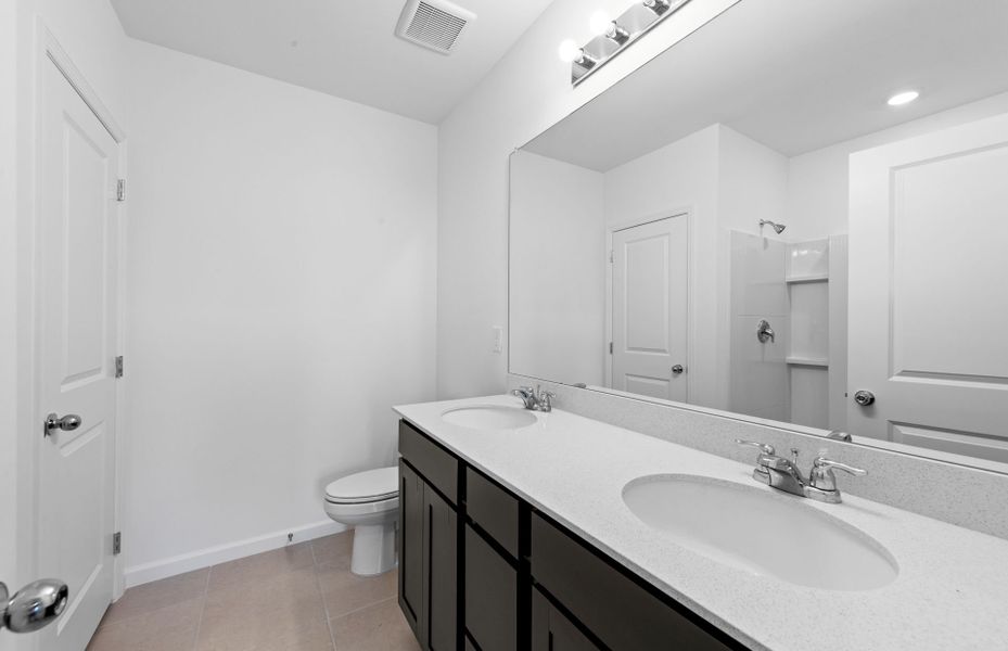 Furnished interior view inside a new home in Caloosa Cove, Labelle (Image 9).