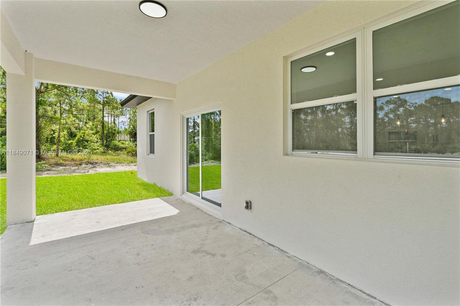 Exterior details and patio area of a home in , Lehigh Acres (Image 3). Exterior details and patio area of a home in , Lehigh Acres (Image 3).