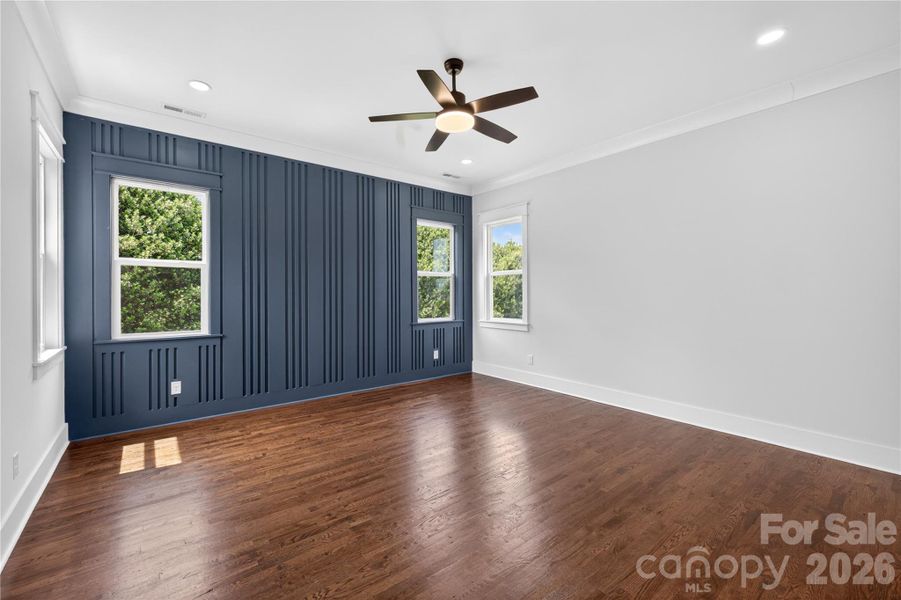 This primary bedroom feels like the kind of bedroom where your phone stays on the nightstand a little longer in the mornings