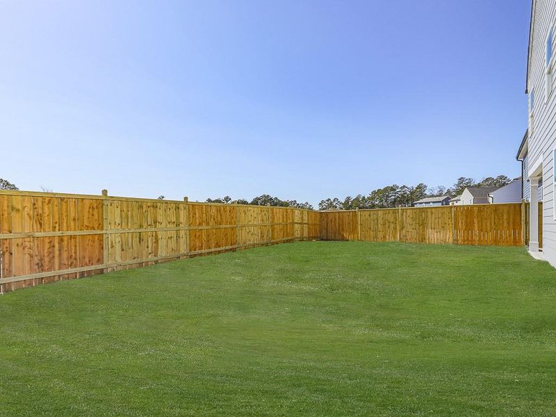 Exterior details and patio area of a home in Kingsley, Acworth (Image 32).
