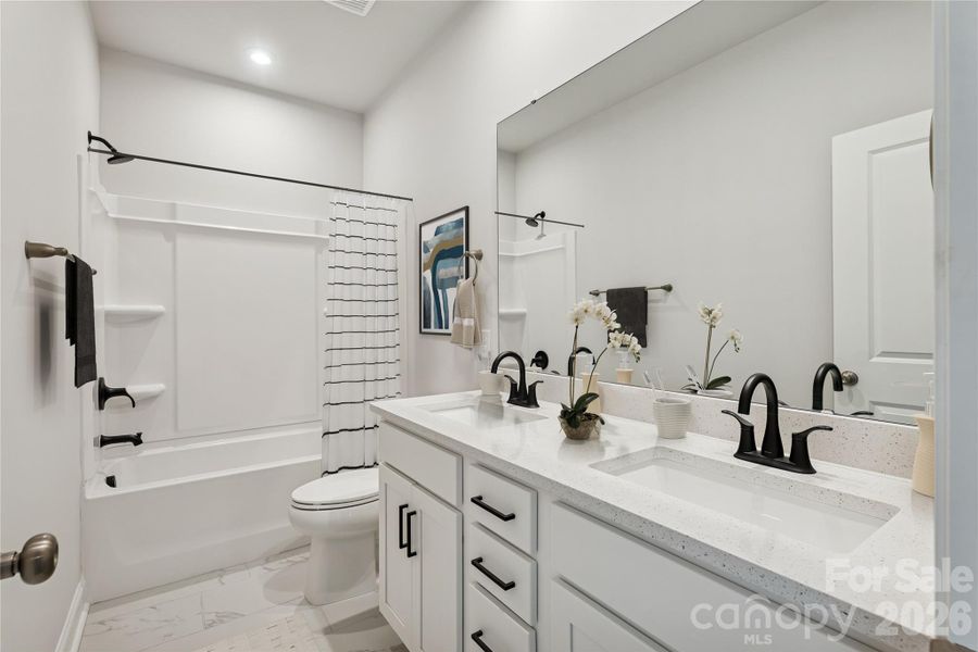 Example Photo Example Photo