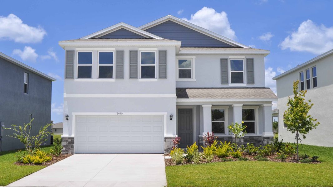 Representative exterior photo of a completed home built from the Coral by D.R. Horton in Seaire, Parrish, FL (Image 1). Representative exterior photo of a completed home built from the Coral by D.R. Horton in Seaire, Parrish, FL (Image 1).
