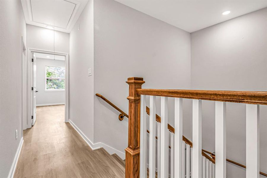 Second floor landing to the primary bedroom.