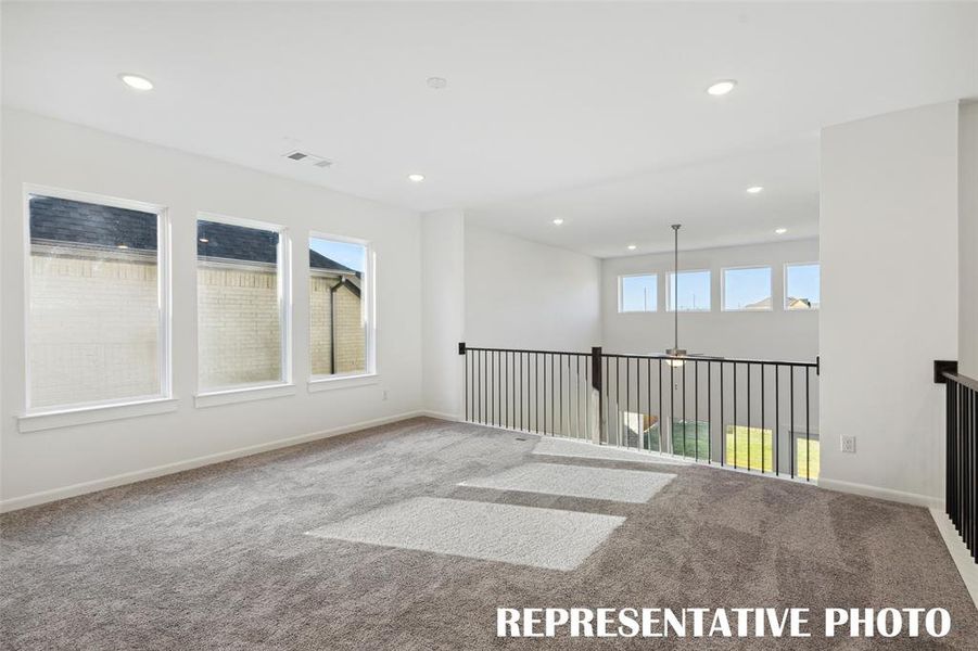 The entire family will enjoy fun times in this open and airy game room! REPRESENTATIVE PHOTO The entire family will enjoy fun times in this open and airy game room! REPRESENTATIVE PHOTO