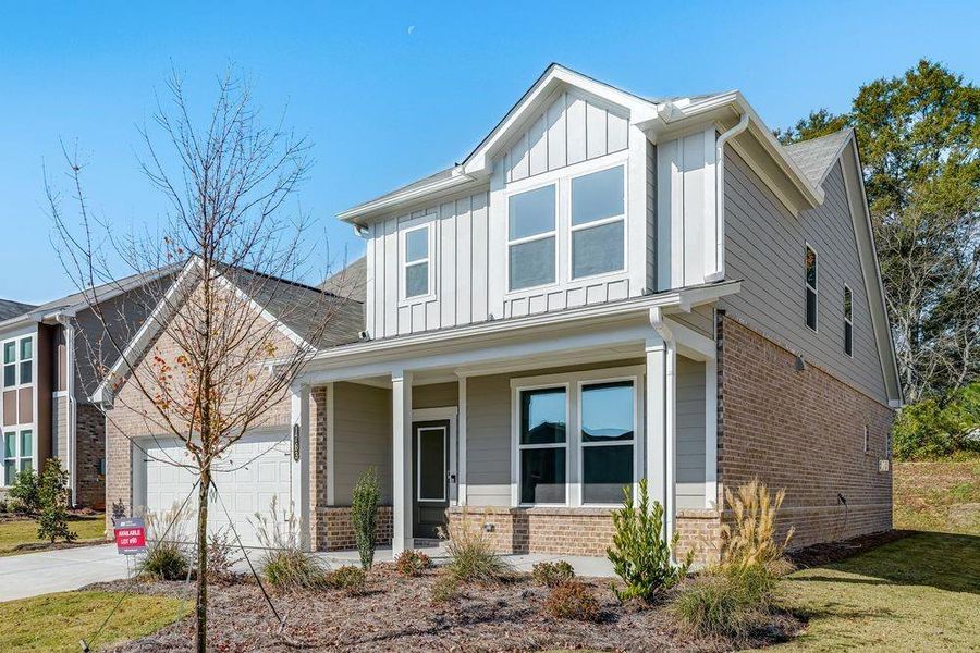 Front exterior of a new home in Windance Lake, Loganville, GA, highlighting curb appeal (Image 2).