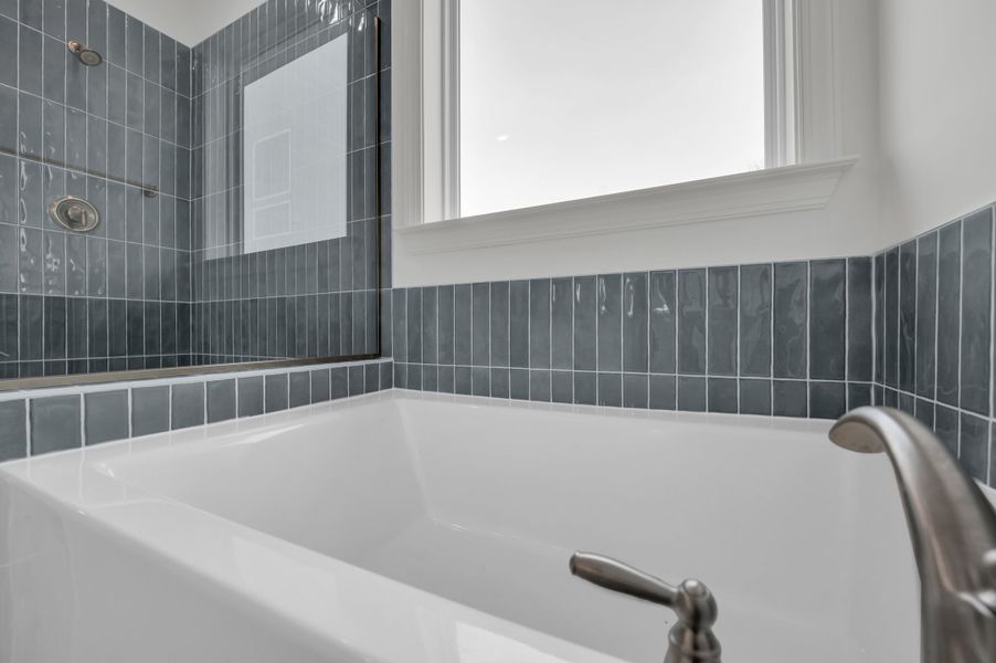 Representative furnished interior of a home built from the The Hampton by RobuckHomes in Windwater, Hampstead (Image 16).