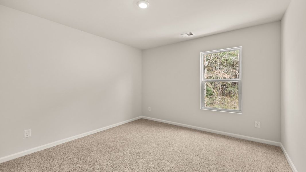 Spacious, unfurnished interior of a new home in The Reserve at Calcutta, Stockbridge (Image 23).